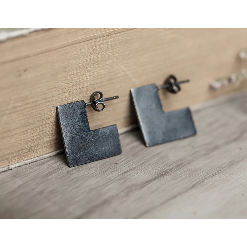 Oxidised black geometry square sterling silver earrings showing minimalist design and 16mm size