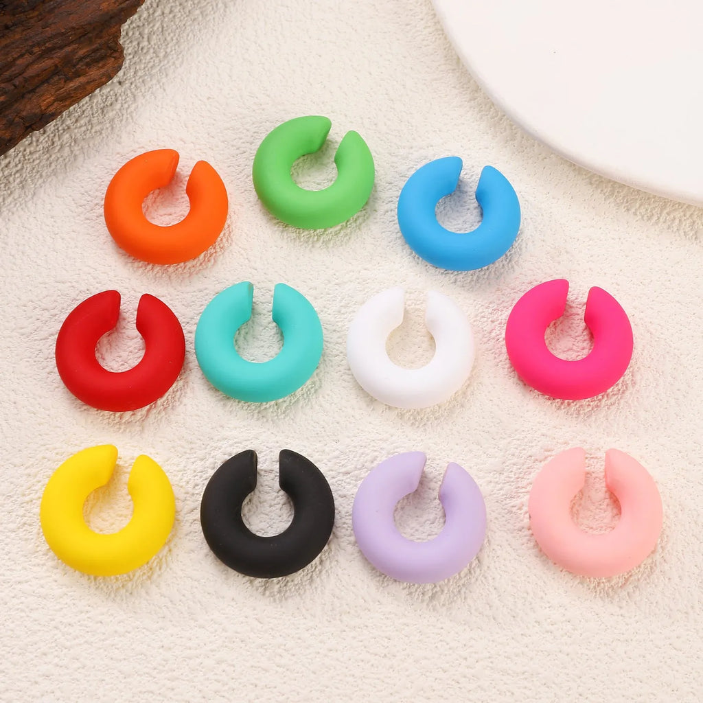 CCB material non-piercing ear clips in geometric C-shape with matte candy colours