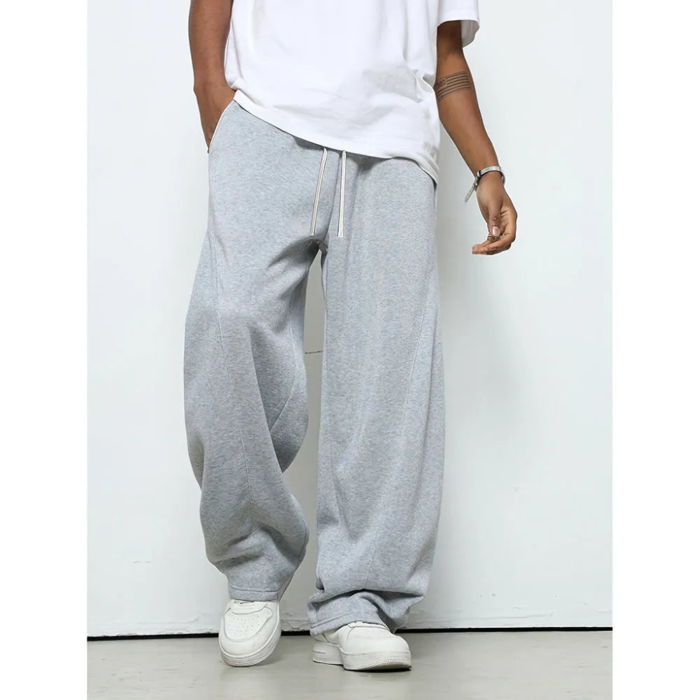 Men's straight-leg casual trousers in polyester fabric with drawstring waist in solid colour options
