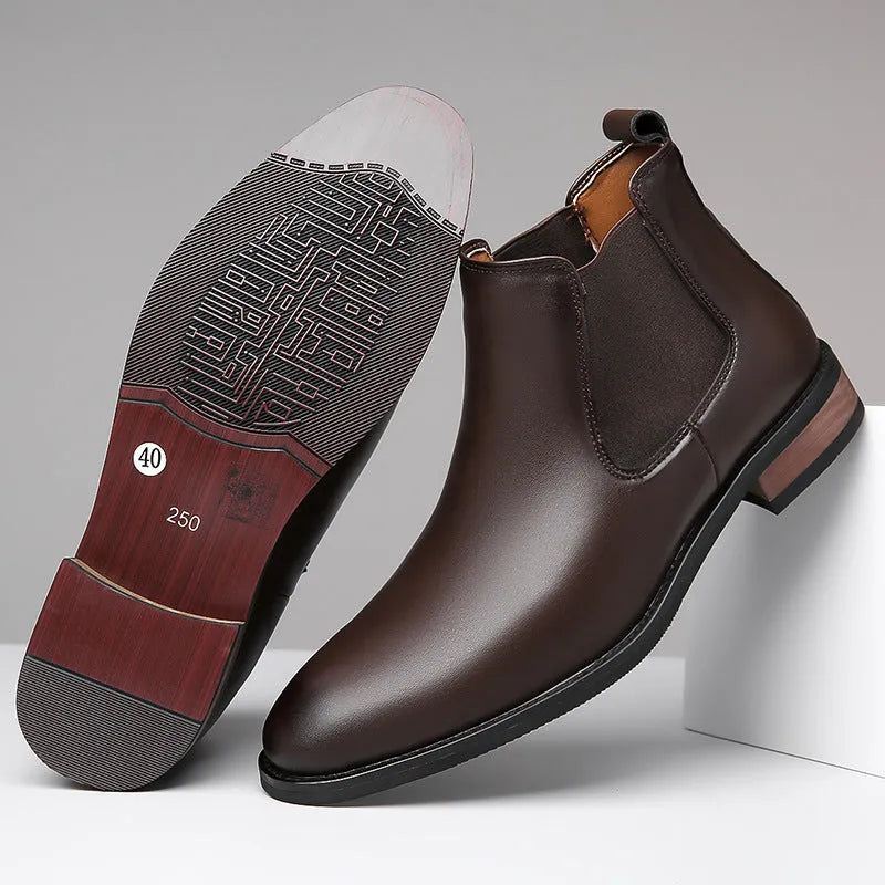 Men's black Chelsea boots with pointed toe and artificial PU leather upper on rubber sole
