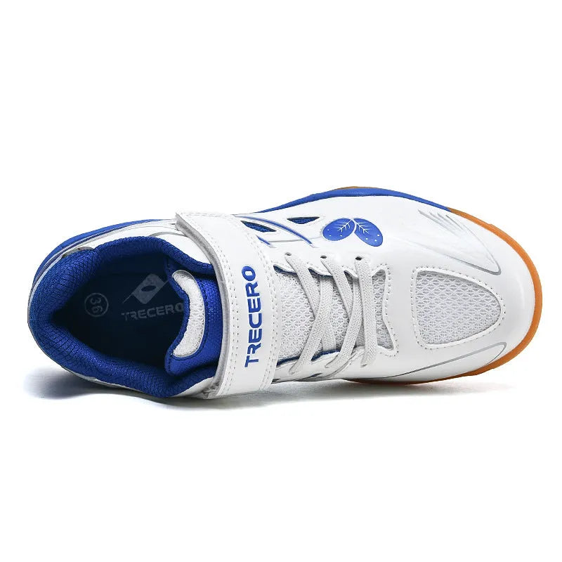 White and blue lightweight badminton shoes with ribbed sole and low-top PVC upper.