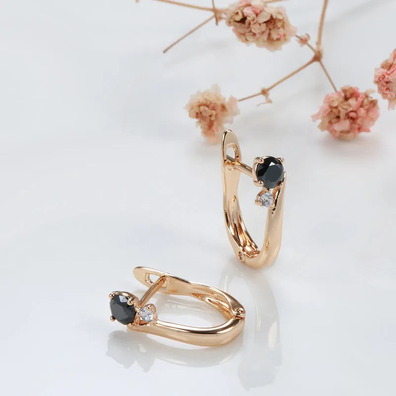 Women's black agate drop earrings with gold-plated copper geometric settings