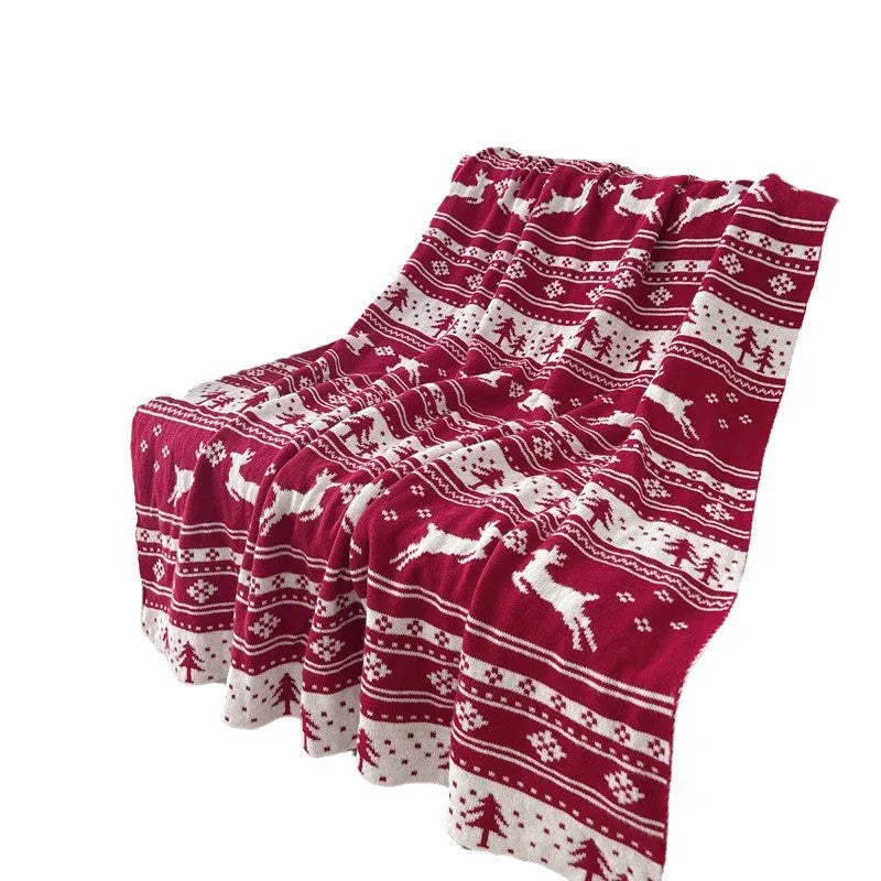 Christmas blanket with snowflake and reindeer patterns in acrylic material