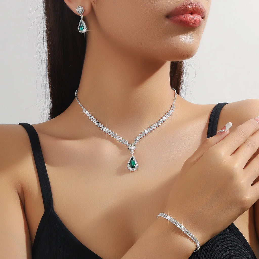 Claw chain necklace and matching earrings set with water drop rhinestone design in multiple colours
