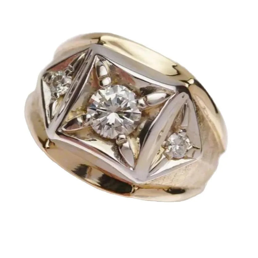 A pair of wide, geometric copper couple rings with a hollow design and chamfered square pattern in gold colour.