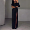 Women's long sleeve jumpsuit with oblique shoulder and high slit leg in polyester.