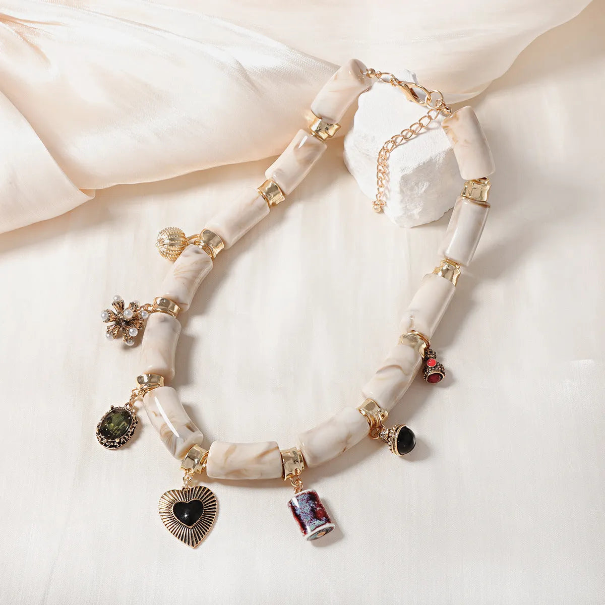 Bamboo resin heart pendant necklace with electroplated finish in pictured colour
