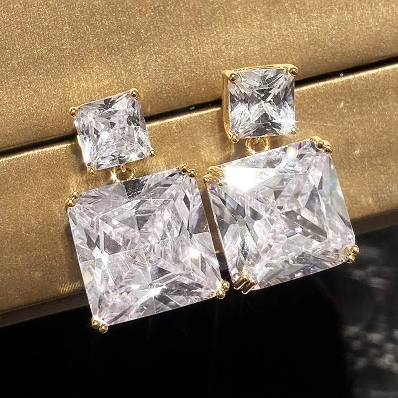 Geometric square copper earrings with quadrilateral ornament detail in white gold or gold tone finish