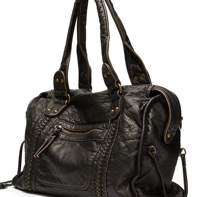 Women's brown French retro motorcycle messenger bag with woven decoration and shoulder strap