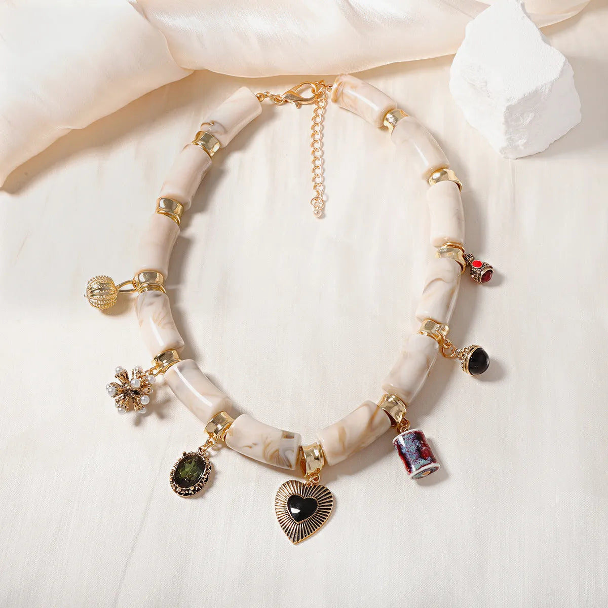 Bamboo resin heart pendant necklace with electroplated finish in pictured colour