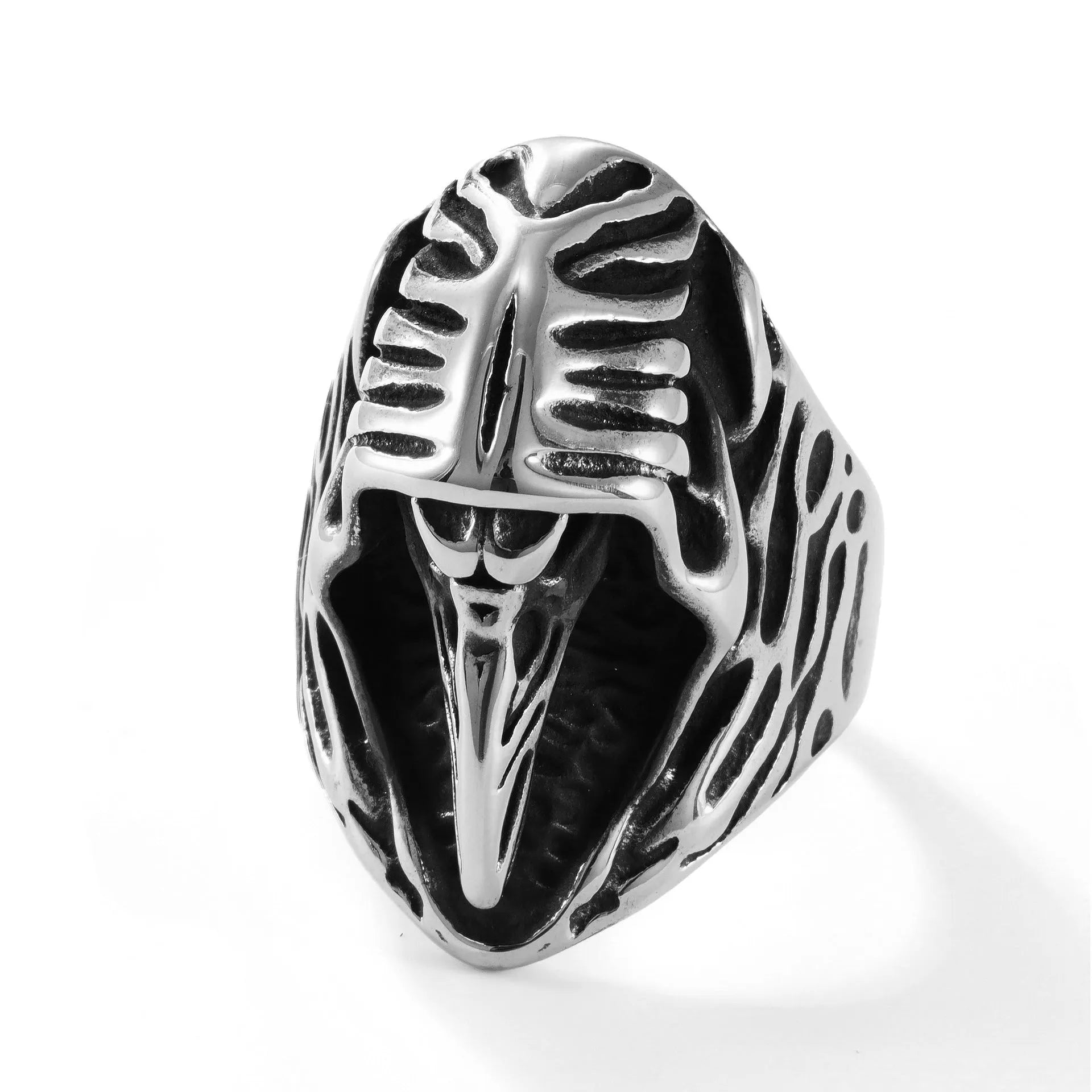 Geometric crow punk ring in titanium steel with MR166 colour on finger