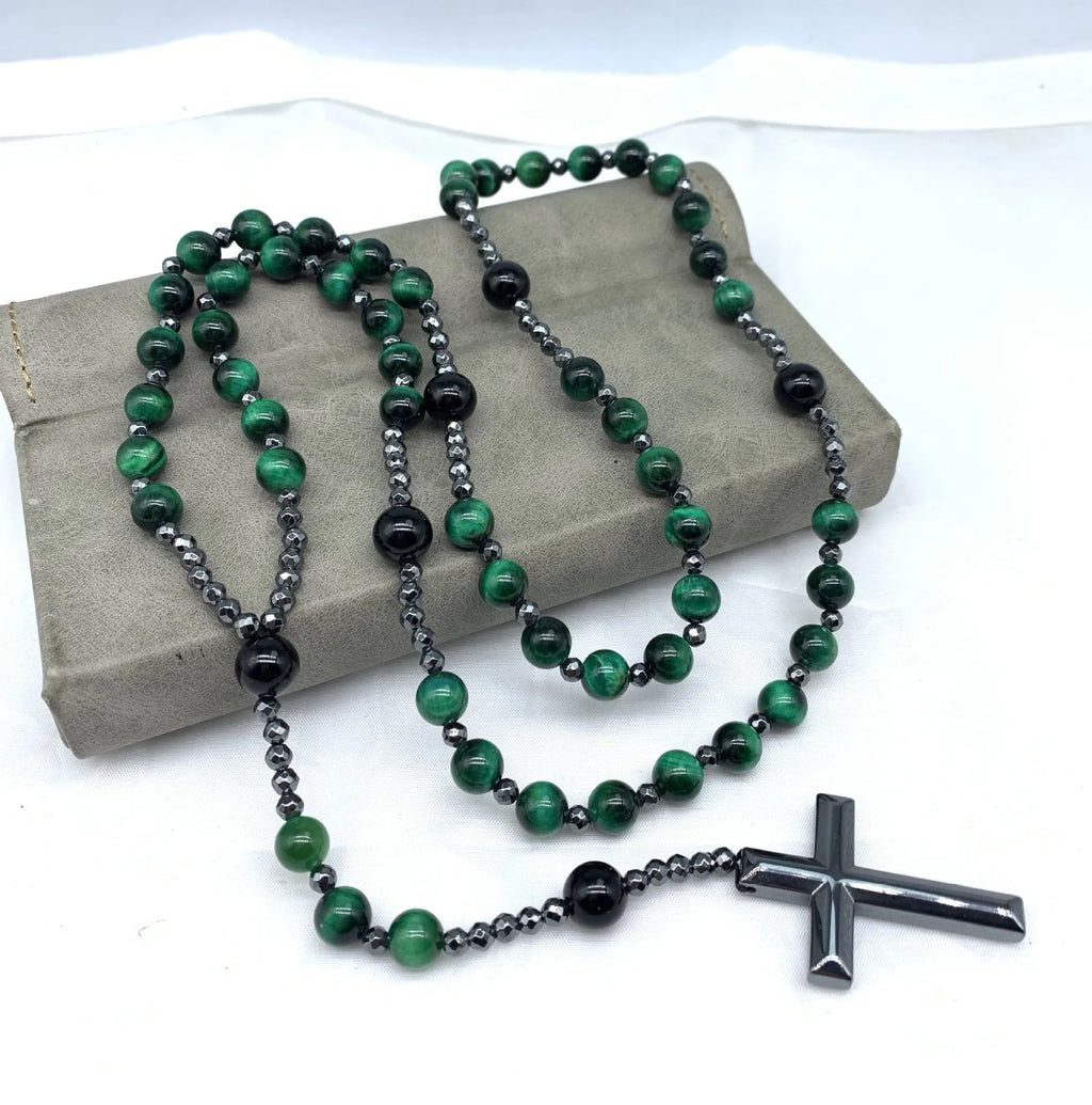 Men's hand-woven stone cross pendant necklace on a ball bead chain with safety lock clasp.