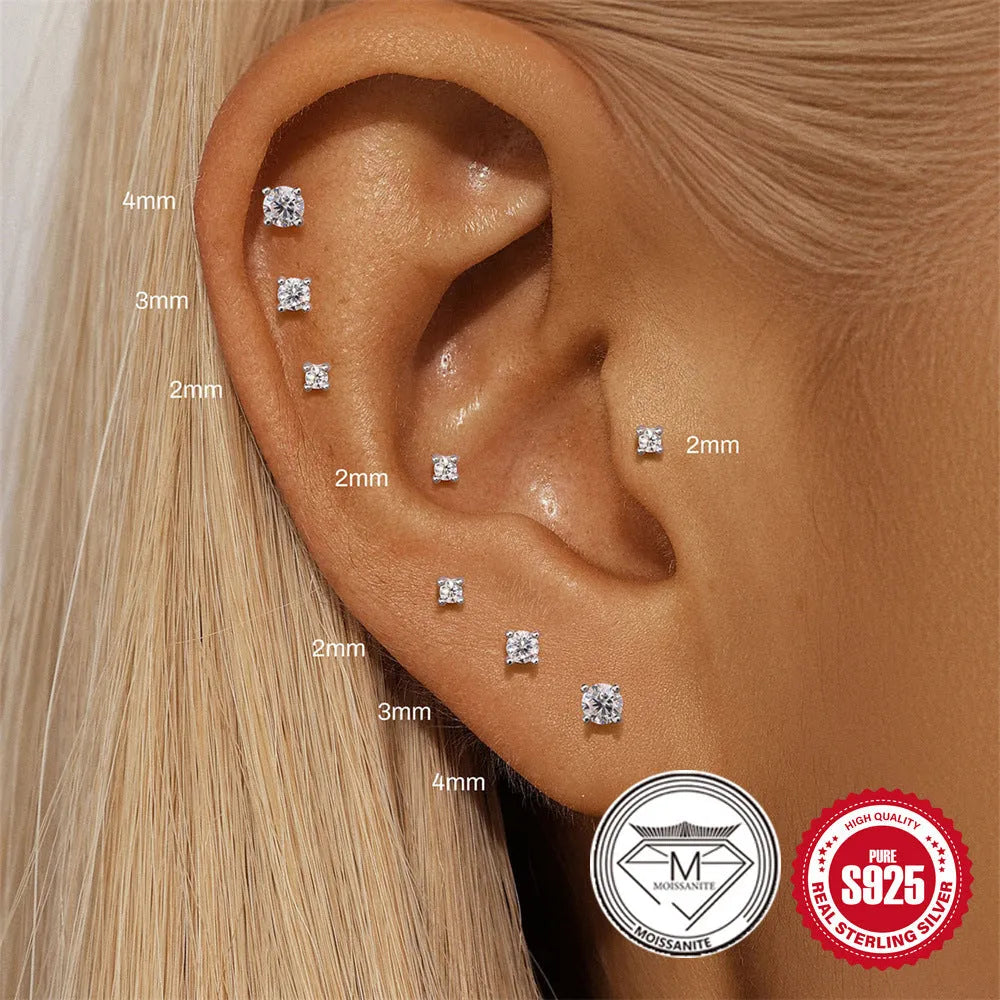 Geometric petal diamond stud earrings in platinum-colour sterling silver with ear clip fastening