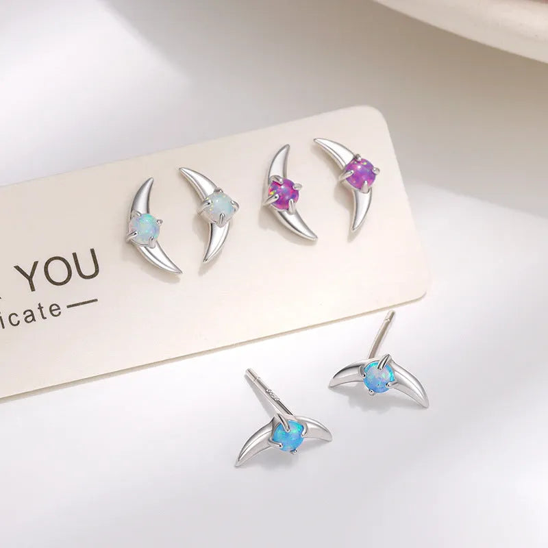 Women's geometric earrings in 925 silver with electroplated finish showing six colour variations