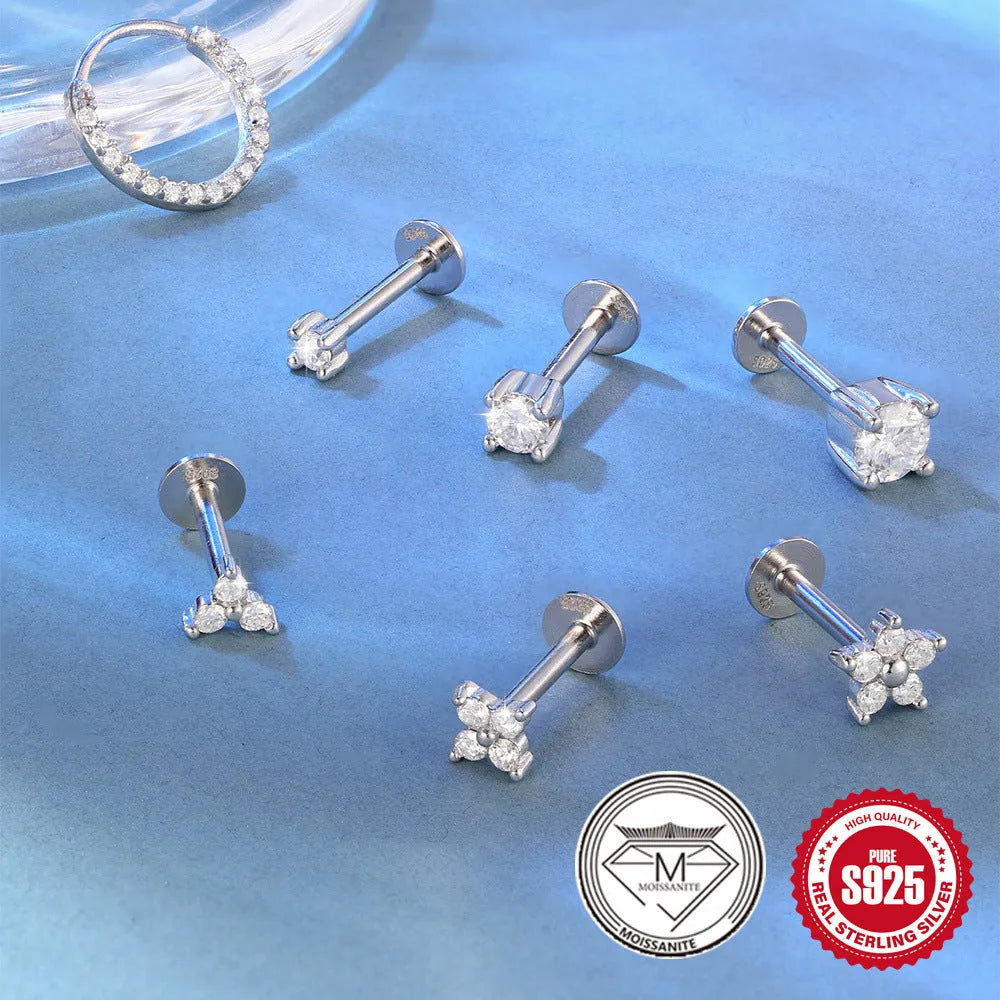 Geometric petal diamond stud earrings in platinum-colour sterling silver with ear clip fastening