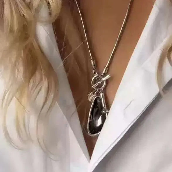 Long geometric pendant sweater chain necklace with snake bones chain in blue, champagne, or grey.
