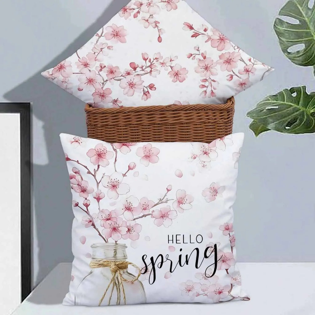 Square short velvet cushion cover with pink cherry blossom and letter print, 45cm.