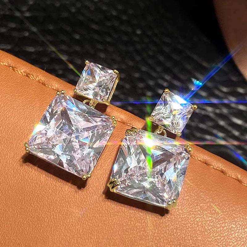 Geometric square copper earrings with quadrilateral ornament detail in white gold or gold tone finish