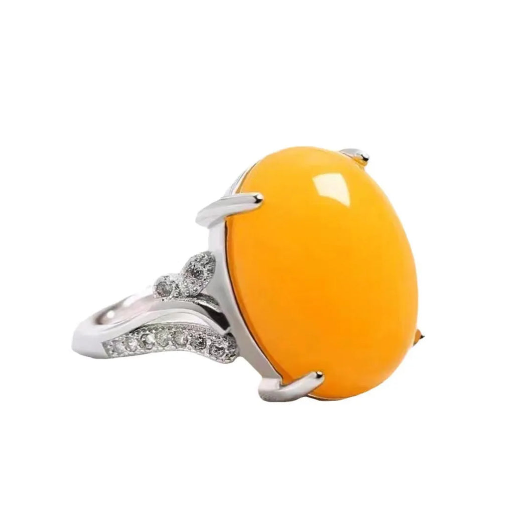 Geometric ethnic-style adjustable ring with a sapphire element in alloy, shown in multiple colours.