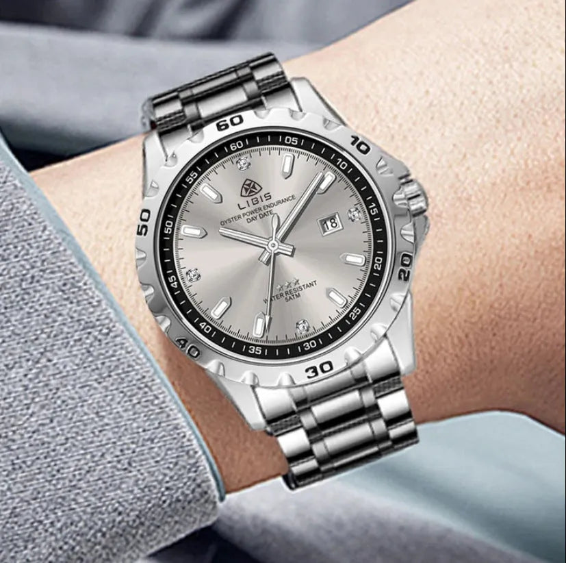 Men's silver stainless steel watch with luminous hands and sapphire crystal glass