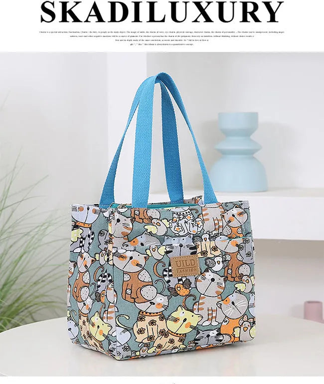 Women's printed canvas tote bag with aluminium frame in floral and animal print designs