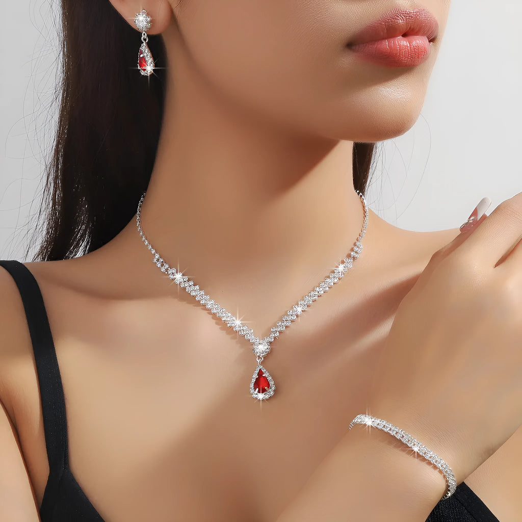 Claw chain necklace and matching earrings set with water drop rhinestone design in multiple colours