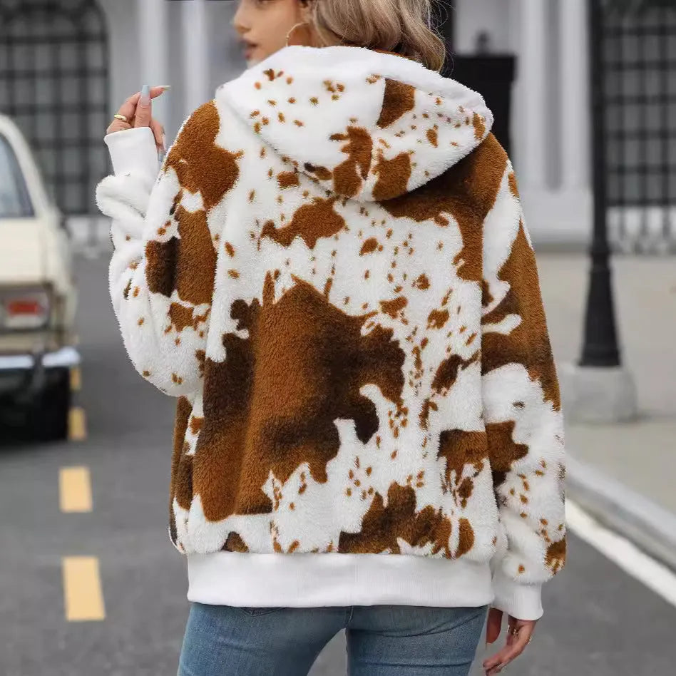 Yellow brown cow animal print hooded cardigan jacket with zip front and regular sleeves.
