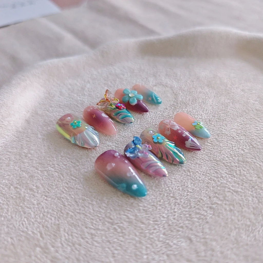 Handmade colourful nail art sculptures with embossed flower and butterfly patterns in four sizes