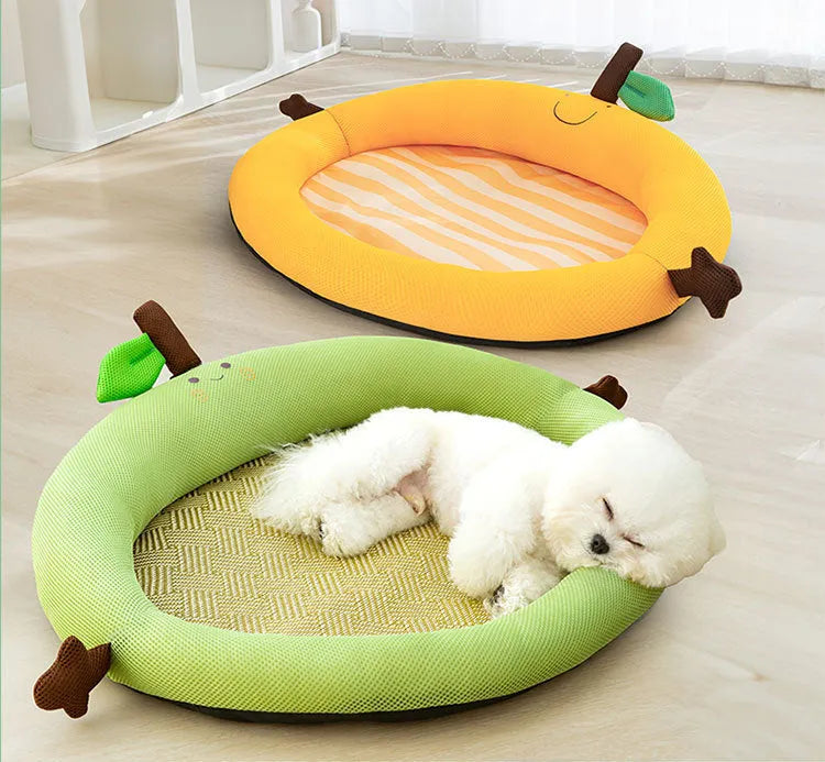 Green and yellow pet cooling mat with nest design backrest showing four size options for dogs and cats