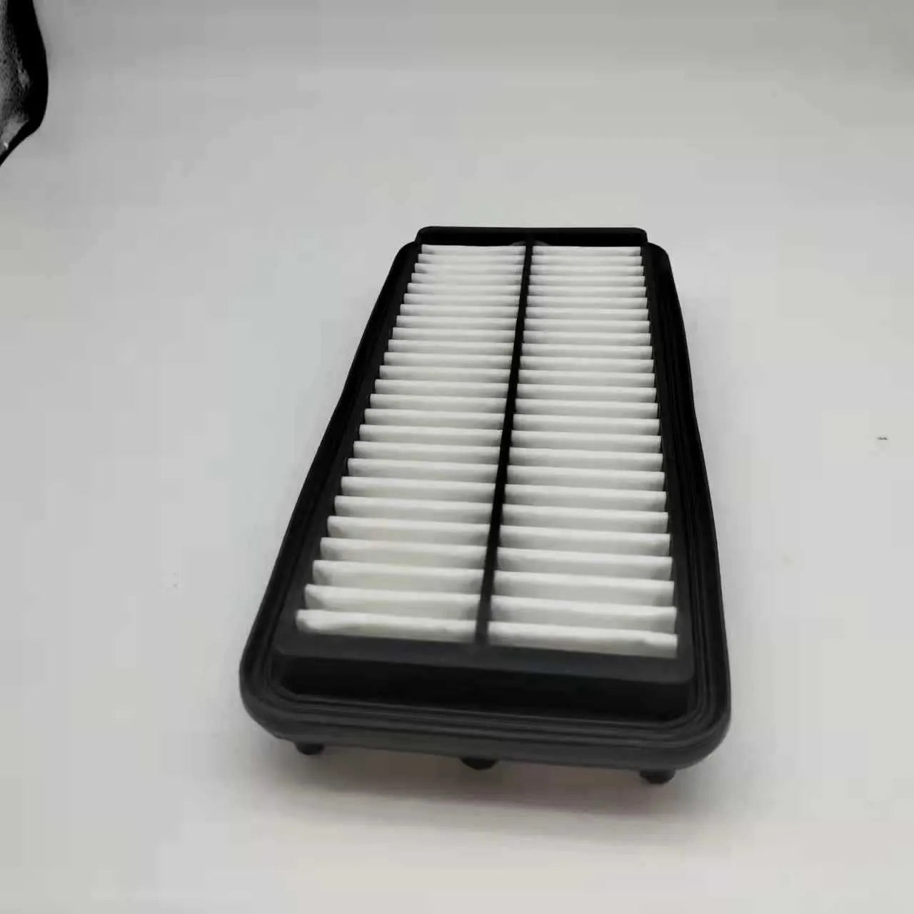 Black car air filter for Modern vehicles with dimensions 256*113*40 mm