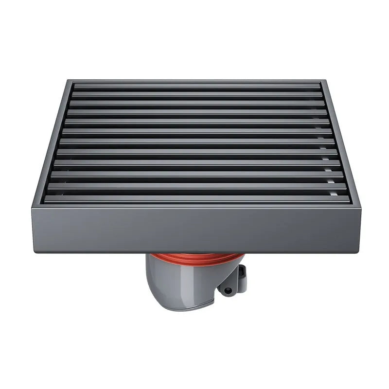 Gun grey 15cm square ABS plastic core sitting in a 304 stainless steel courtyard floor drain frame.