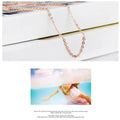 Women's heart-shaped pink crystal pendant necklace with rose gold cross chain