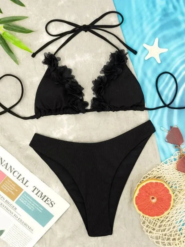 Black polyester two-piece swimsuit set with bikini top and gathered waist shorts.