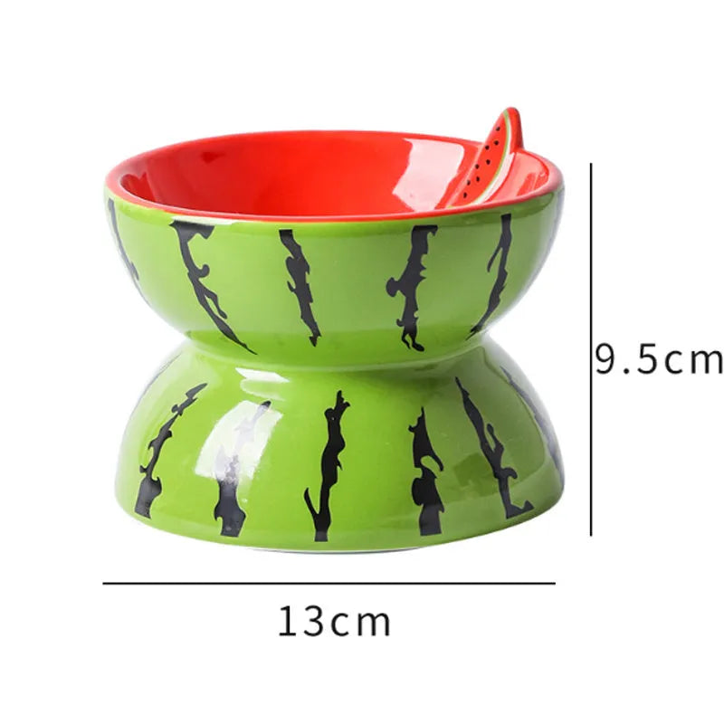 Ceramic raised cat bowl in orange with tilted design for food and water