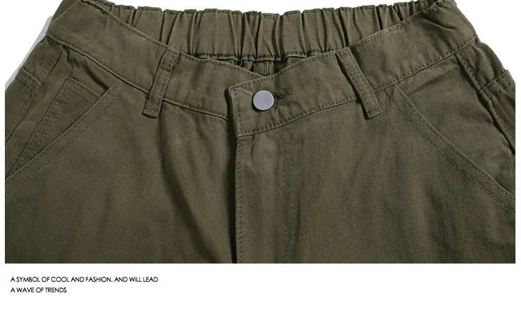 Casual workwear-style cropped wide-leg shorts in apricot colour with mid waist and micro-elastic fabric.