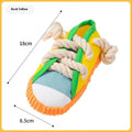 Plastic dog slipper chew toy with squeaker in yellow, black, or blue colour options