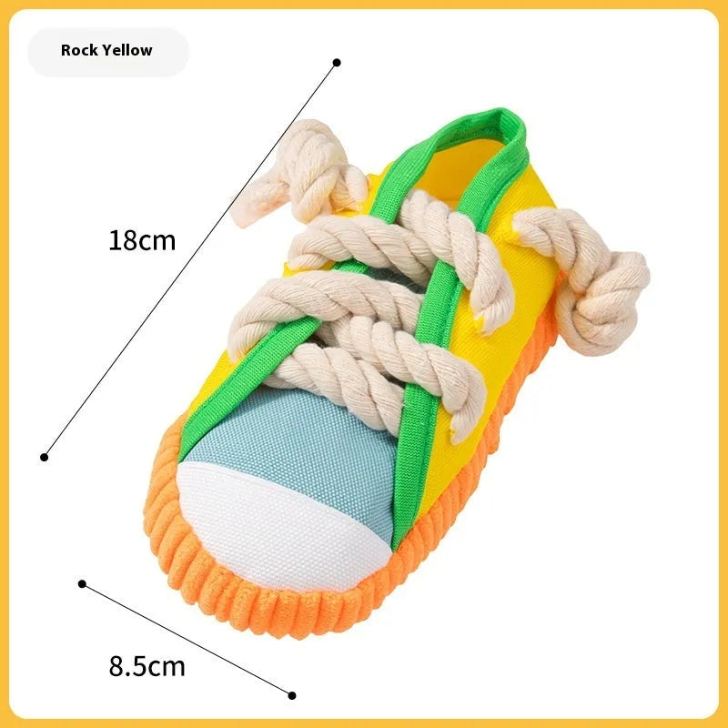 Plastic dog slipper chew toy with squeaker in yellow, black, or blue colour options