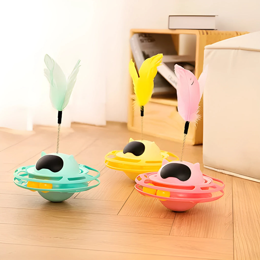 Pink cat stick toy with self-righting tumbler turntable measuring 17cm by 10cm