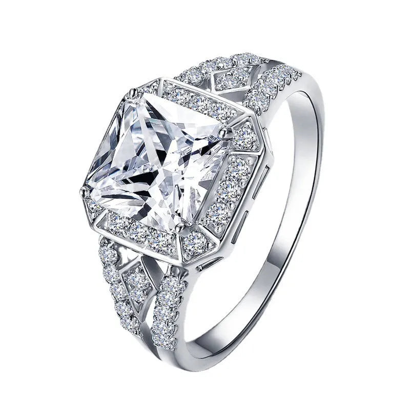 Geometric hollow women's ring with zircon stones in platinum colour