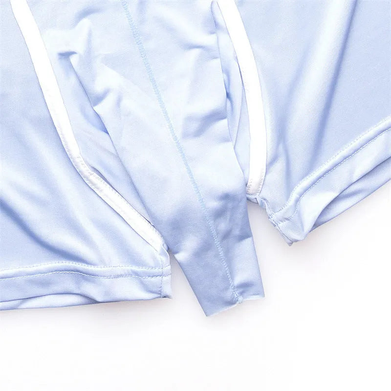 Men's solid colour ice silk boxers on a mid waist, showing available colours: grey, black, green, sapphire blue, sky blue, and blue.