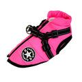 Waterproof dog coat with harness opening in red colour on large breed dog