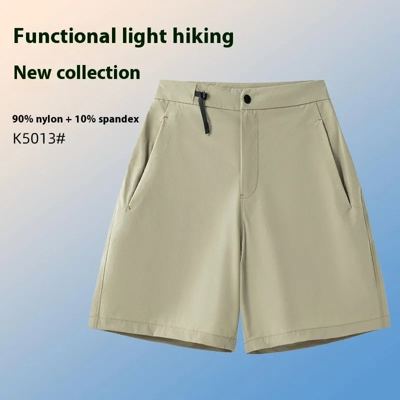 Men's khaki quick-drying sports shorts with elastic waist and 3D cut design for running and outdoor activities.