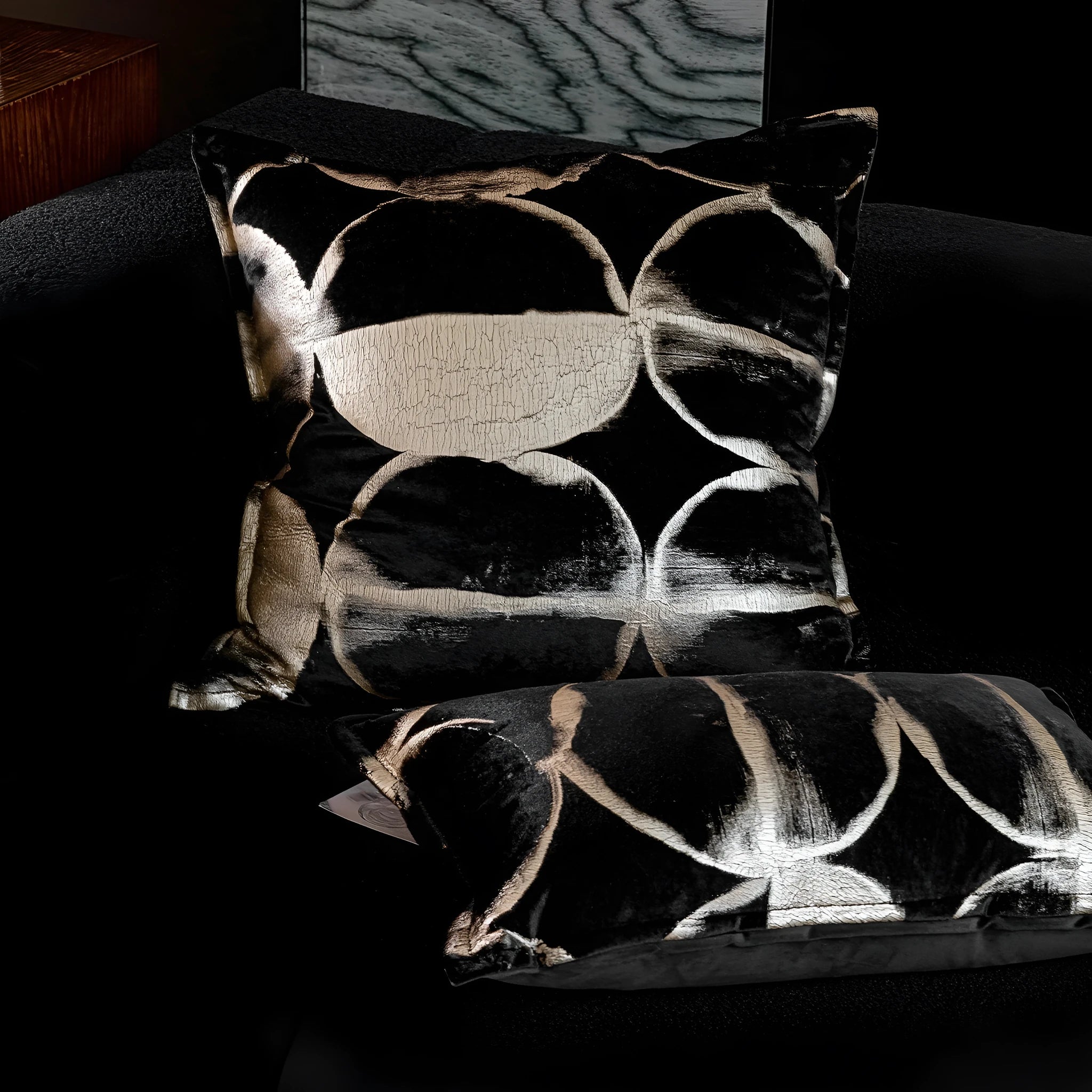 Abstract pattern black and gold flannel decorative cushion with removable cover.