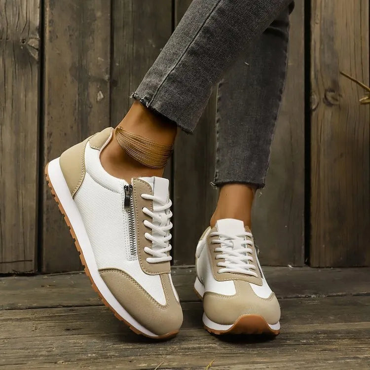 Women's flat-heeled shoes in artificial PU leather with rubber soles showing neutral colour options