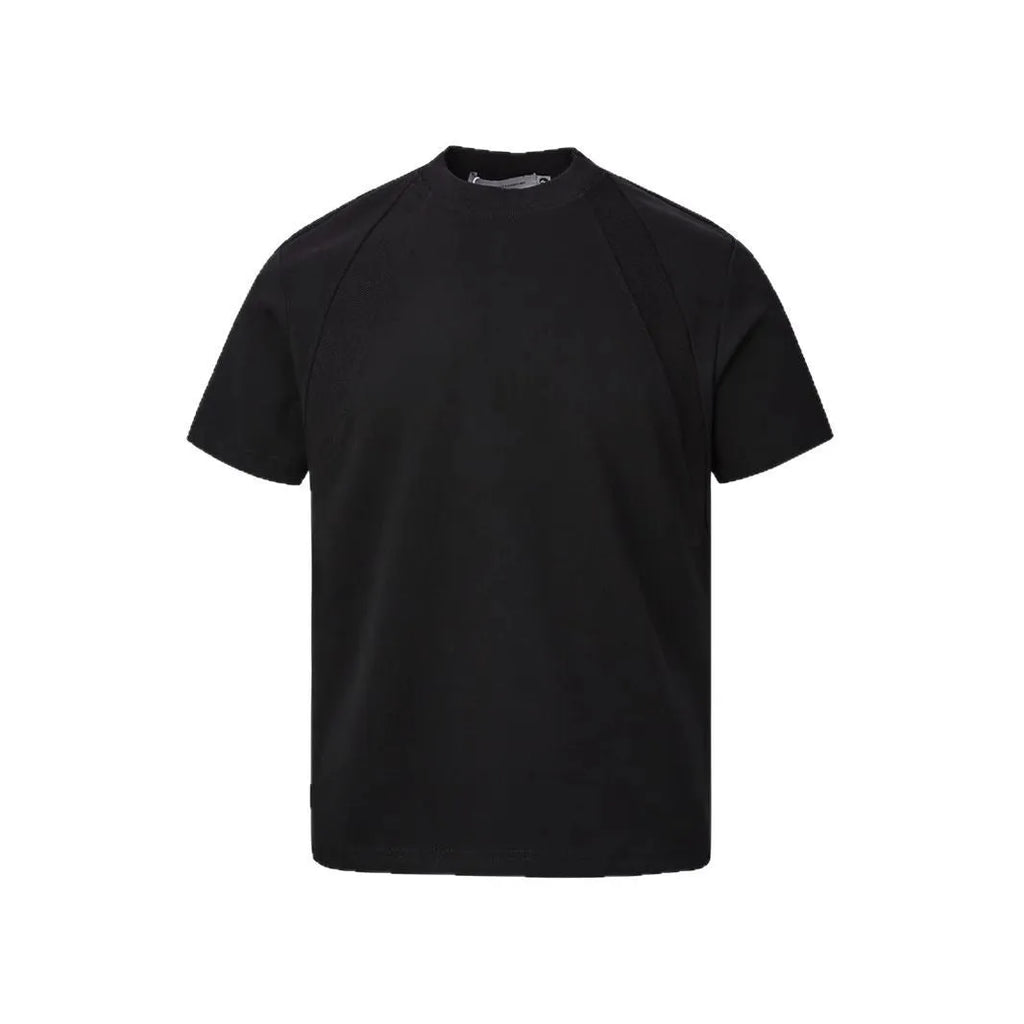 Loose-fit short sleeve top with textured air layer stitching in black.