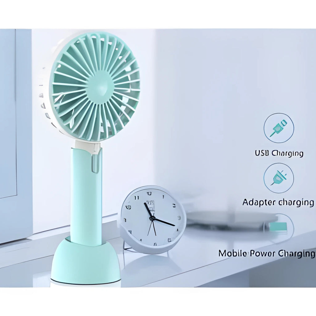 Blue handheld USB mini fan with three-speed buttons and oscillation function on a desk.