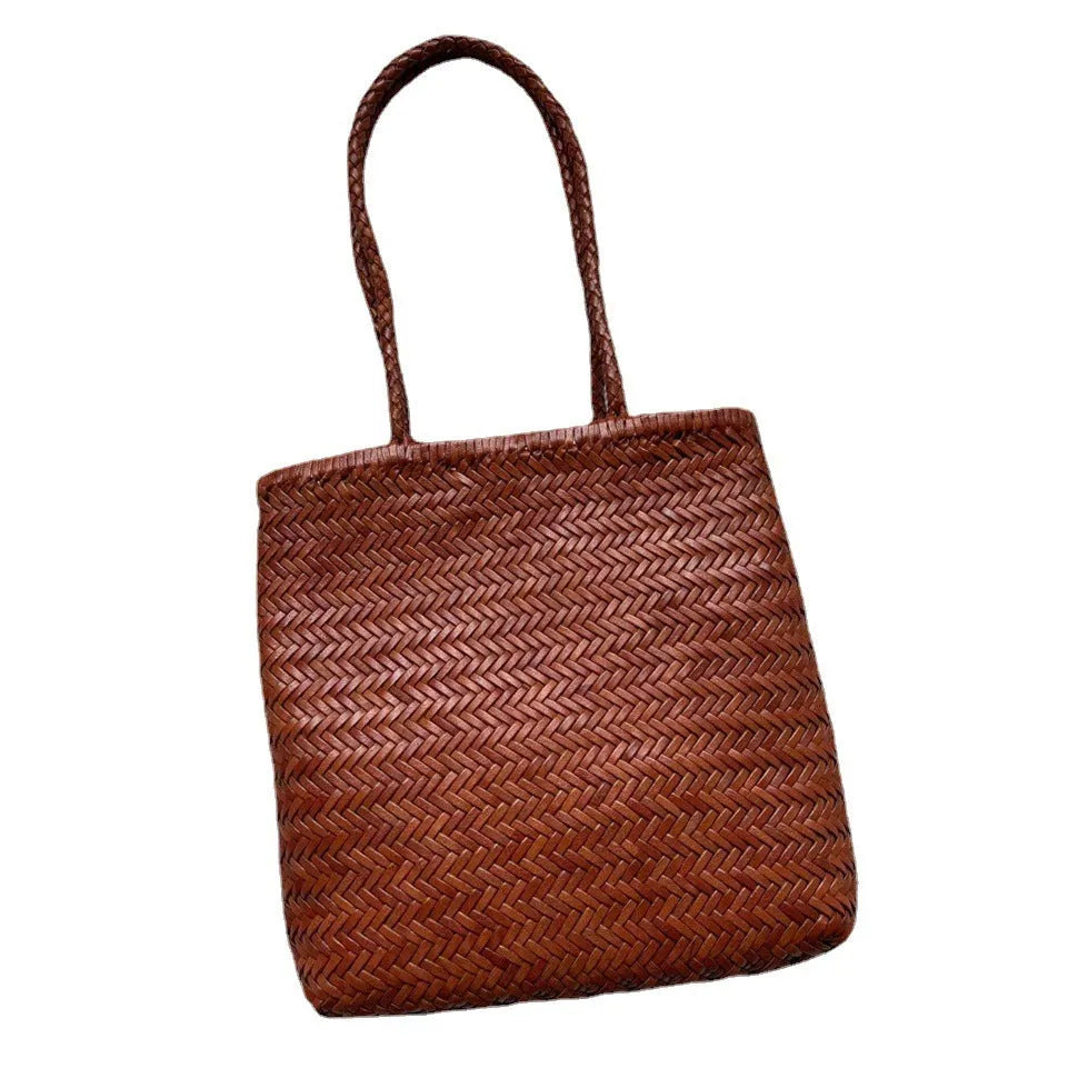 Brown woven leather tote bag with three-dimensional pockets measuring 27x30x6cm