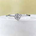 Minimalist silver ring with crown shape and linear details in platinum or gold finish