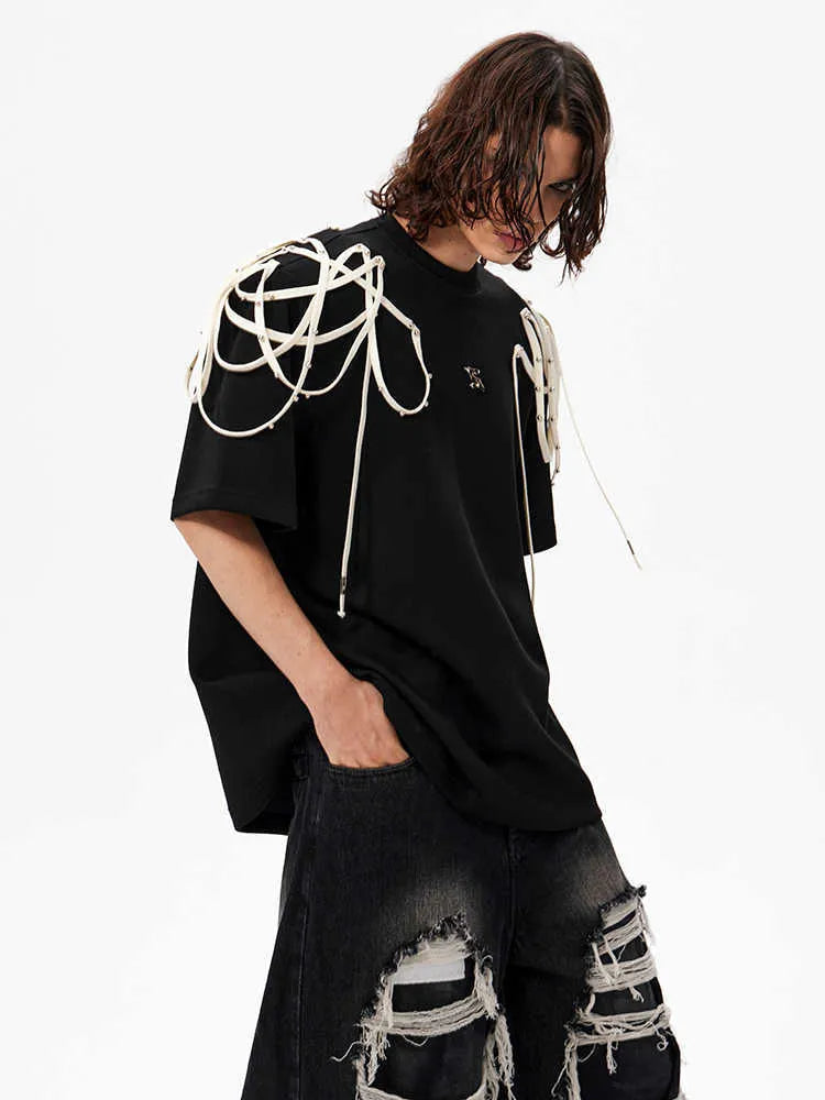Black women's T-shirt with rivet ribbon padded shoulders and loose fit short sleeve design