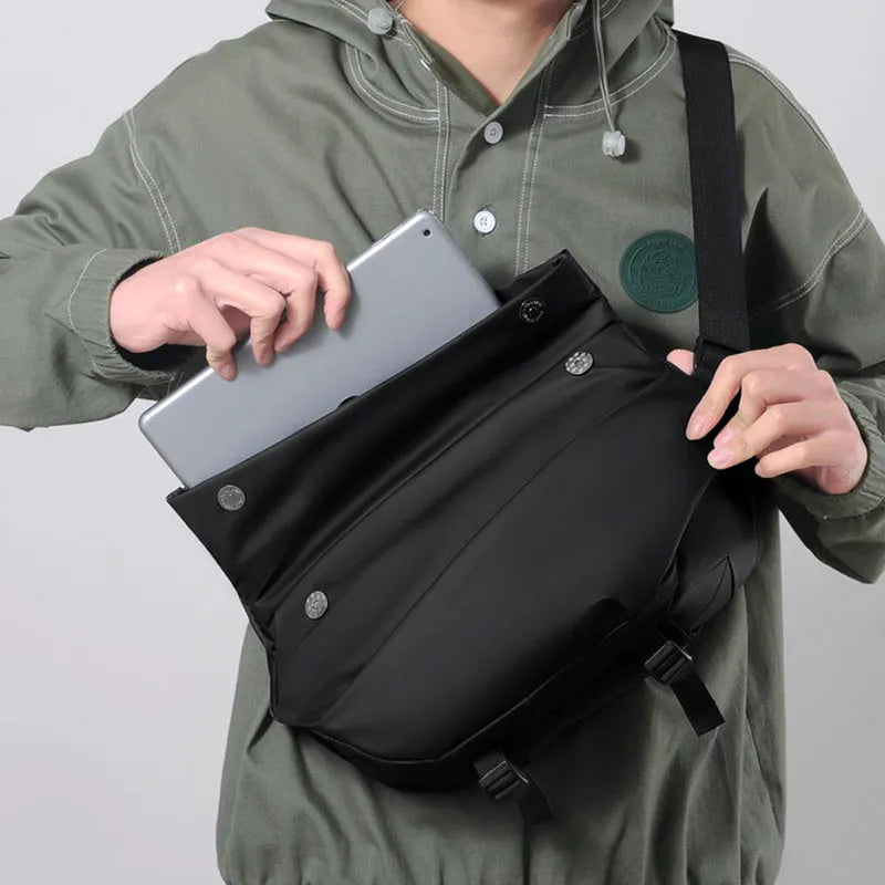 Grey PU crossbody bag showing shoulder strap and internal phone compartment